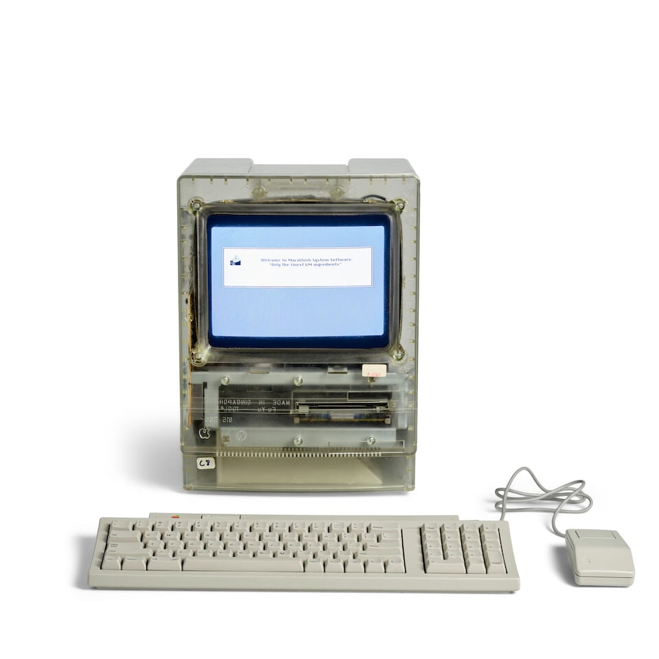 A CLEAR PLASTIC PROTOTYPE MACINTOSH 'APOLLO' CLASSIC II. A Clear Plastic Prototype Macintosh 'Ap...: A CLEAR PLASTIC PROTOTYPE MACINTOSH 'APOLLO' CLASSIC II. A Clear Plastic Prototype Macintosh 'Apollo' Classic II computer. Apple Computer, Inc.: Cupertino, CA and Singapore, ca. 1990. 260 x 245 x 340 