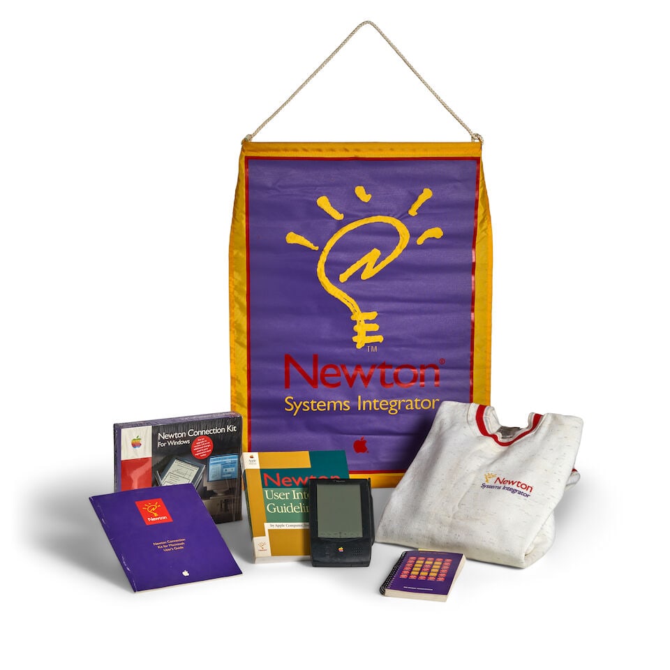 AN APPLE NEWTON MESSAGEPAD WITH MARKETING DISPLAY AND OTHER PROMOTIONAL MATERIAL. Apple Newton M... - 2