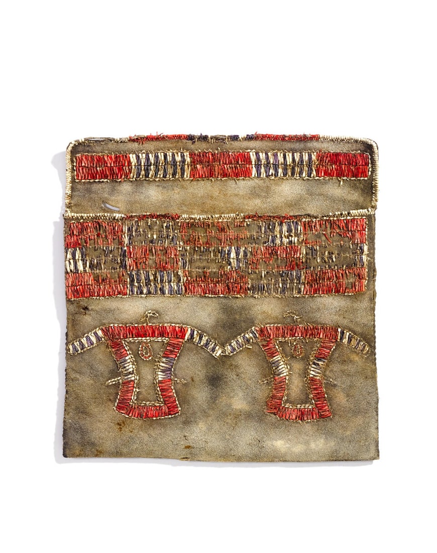 A Great Lakes-style quilled pouch: A Great Lakes-style quilled pouch Mid- to late-20th century reproduction, depicting a pair of spread-winged Thunderbirds below a checkered panel at the top, the underside of the flap similarly