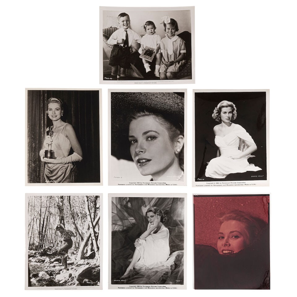 A Group of Grace Kelly Photographs: A Group of Grace Kelly Photographs Comprising 6 gelatin silver photographs, all but one being vintage 1950s, 2 with original snipes/captions on verso, including 2 of Kelly in a white negligee, one of