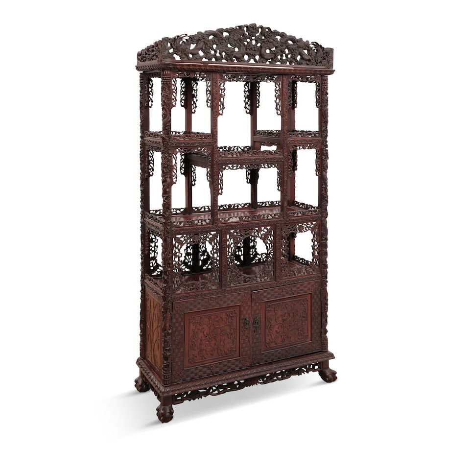 A CHINESE HARDWOOD DISPLAY CABINET 19th/20th century: A CHINESE HARDWOOD DISPLAY CABINET 19th/20th century 81 1/2 x 43 1/2 x 16 1/2in (207 x 110.5 x 42cm) Lot to be sold without reserve. This lot is subject to the following lot symbols: ¤ ¤ Unl