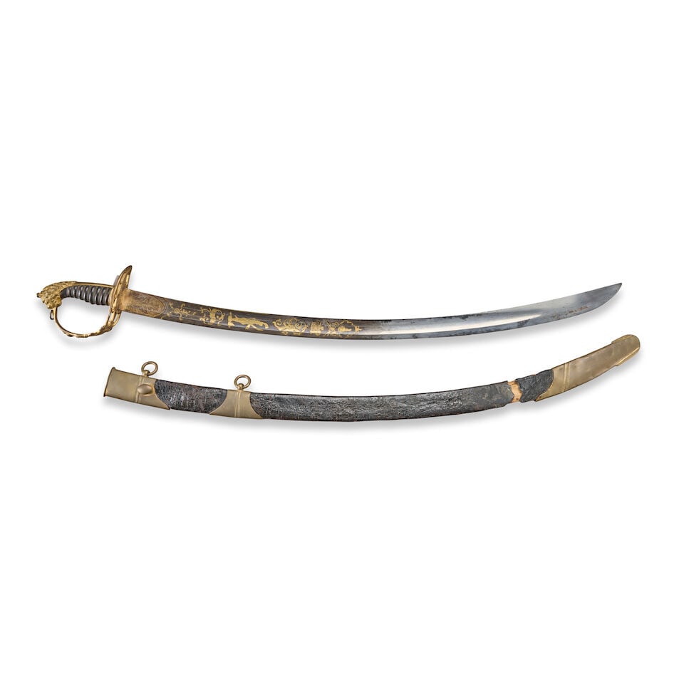 A BRITISH PATTERN 1803 FLANK OFFICER'S SWORD.: A BRITISH PATTERN 1803 FLANK OFFICER'S SWORD. The gilded brass hilt mounting an openwork counter-guard and knuckle bow with flaming bomb emblem and crown over 'GR' connecting to a finely chased lion's
