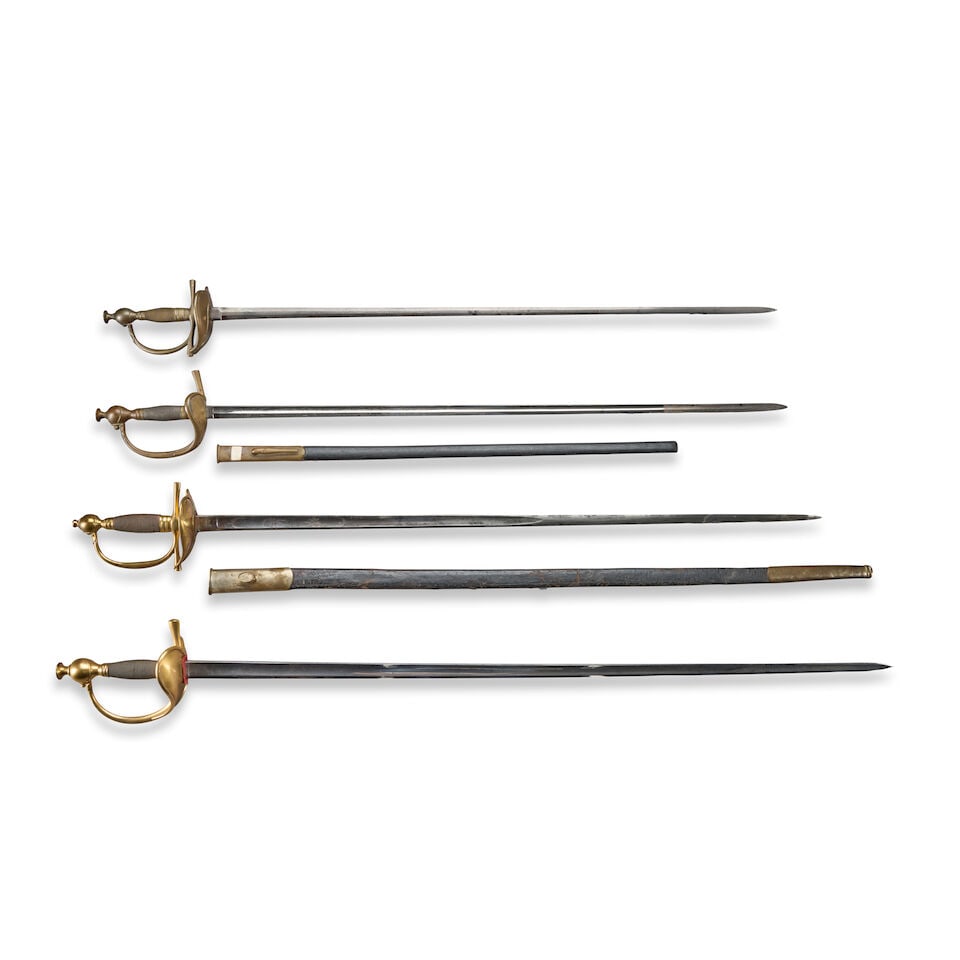 FOUR GERMAN/EUROPEAN BOAT SHELL OFFICER'S SWORDS.: FOUR GERMAN/EUROPEAN BOAT SHELL OFFICER'S SWORDS. The swords featuring wide lobed guards, simple quillons and knuckle bows, ovoid pommels and twisted wire wrapped grips; three blades with single