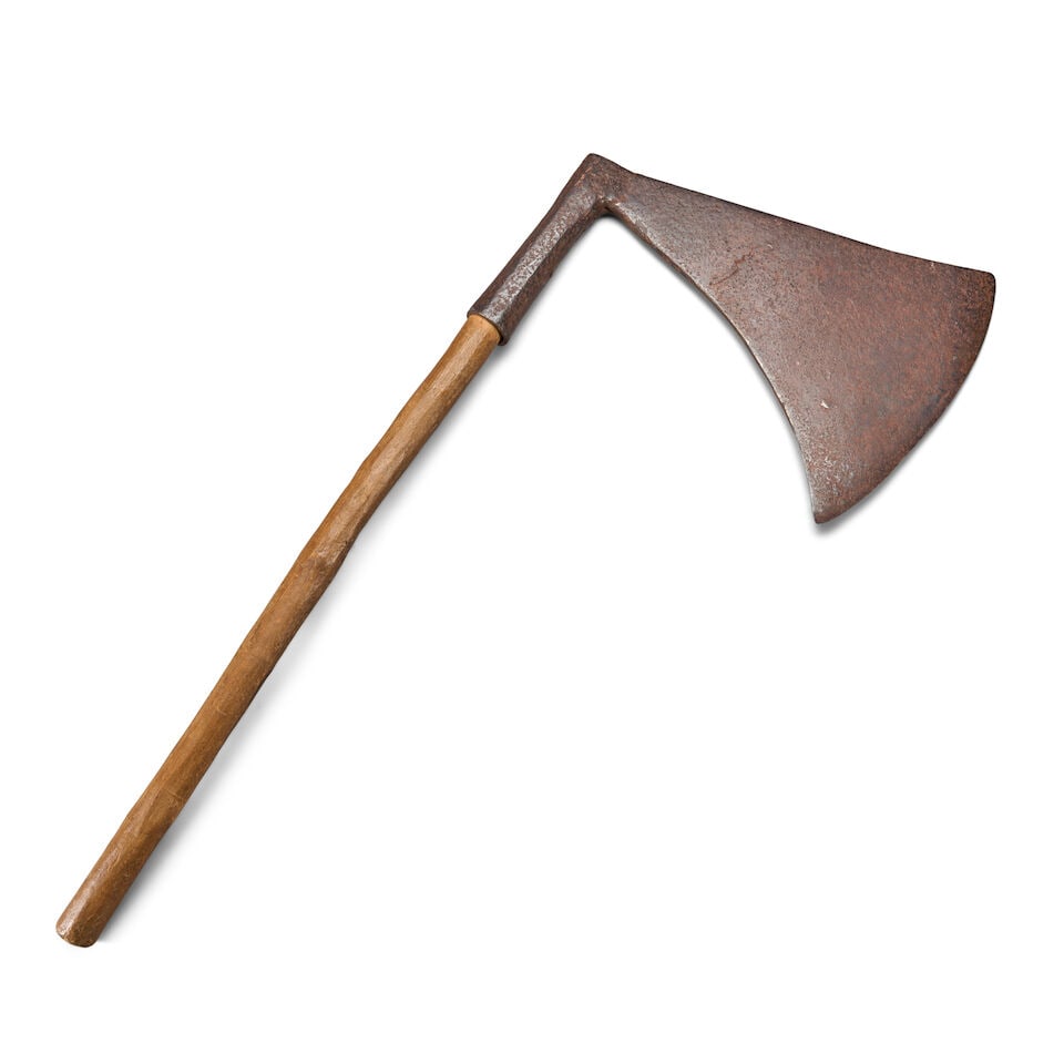 AN EARLY EUROPEAN EXECUTIONER-STYLE AXE.: AN EARLY EUROPEAN EXECUTIONER-STYLE AXE. The broad blade with a stamped maker's mark and tall socket mounted on a later hard wood haft. Ht. 31 in. For further information on this lot please visit