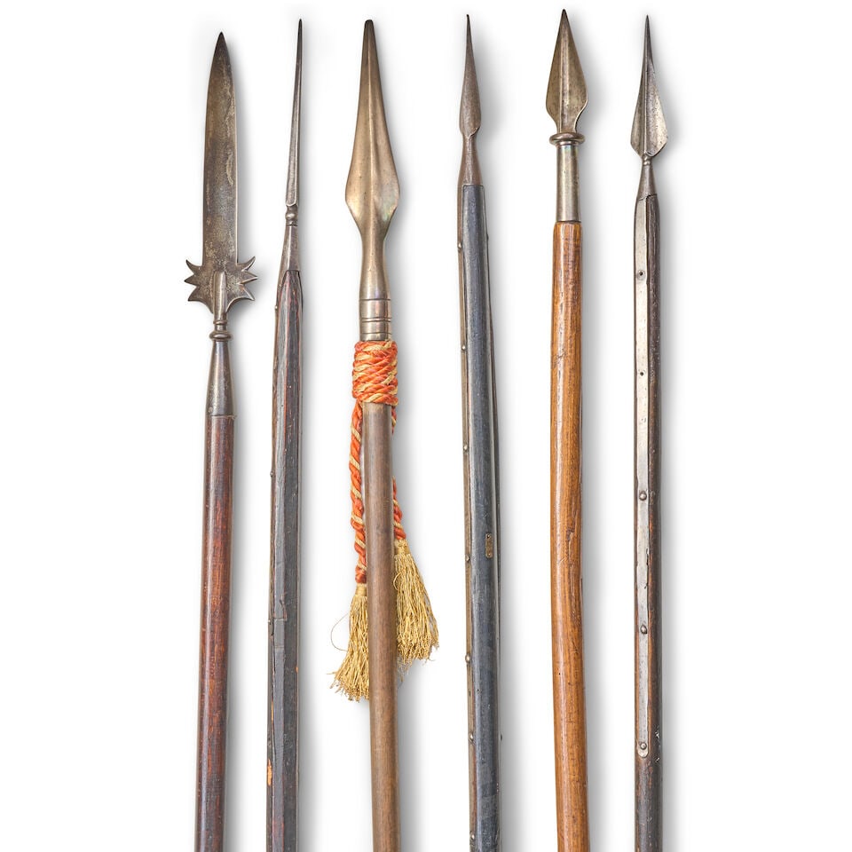 SIX 19TH CENTURY POLEARMS.: SIX 19TH CENTURY POLEARMS. Including a polearm with a partisan-type head; three boarding pikes; and two with pike/flag pole topper heads (poles of various lengths, some straps lacking rivets). Ht. to