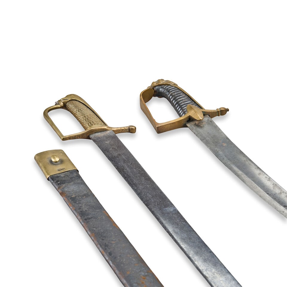 TWO SCANDINAVIAN MILITARY SWORDS. - 2