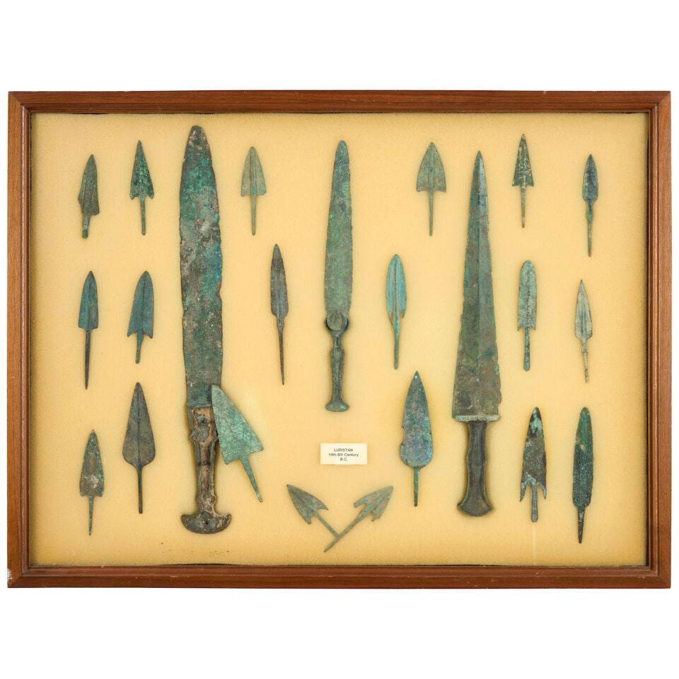 TWO DISPLAY CASES WITH BRONZE DAGGERS AND ARROW POINTS. (1 of 2)