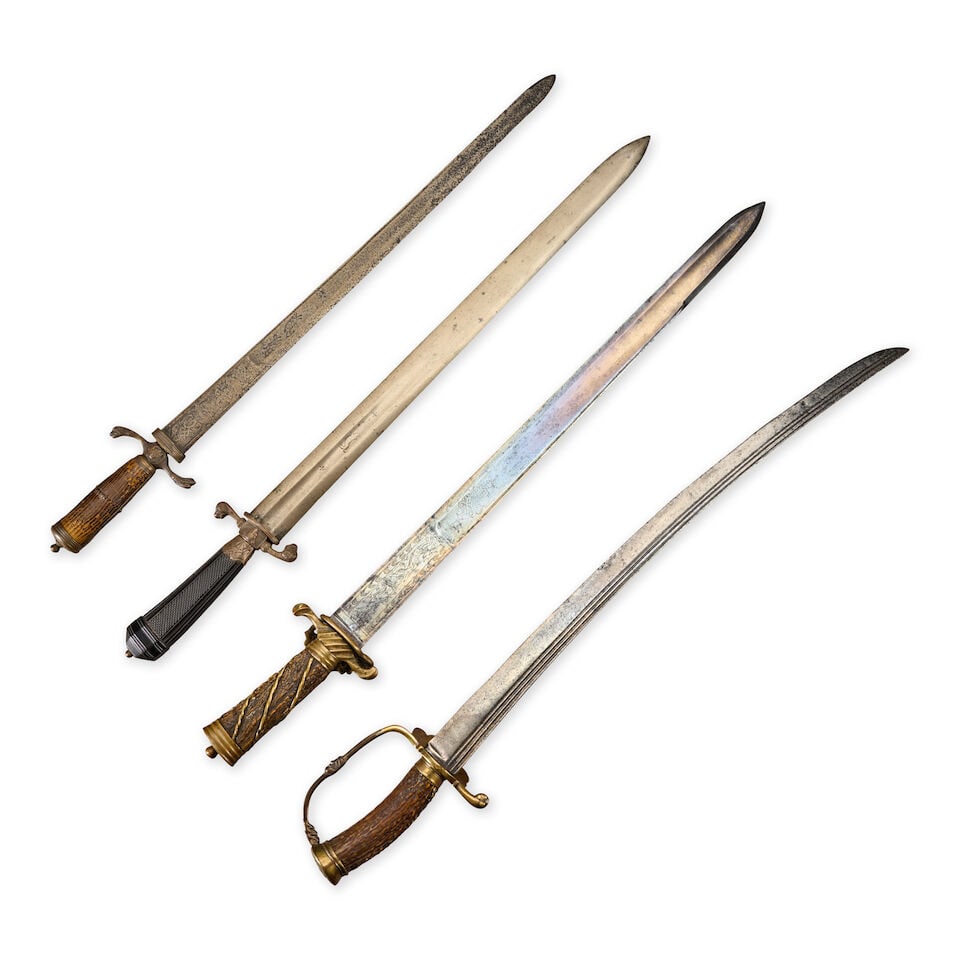 FOUR 18TH CENTURY GERMAN HUNTING SWORDS WITHOUT SCABBARDS. - 2