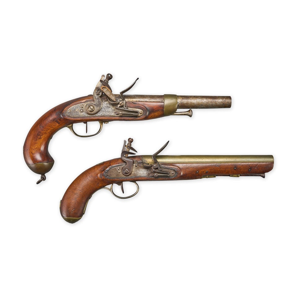 TWO EARLY 19TH CENTURY FLINTLOCK PISTOLS.: TWO EARLY 19TH CENTURY FLINTLOCK PISTOLS. A European pistol with an 8 3/8 in., .69 caliber barrel flat English lock marked 'SUTHERLAND', walnut stock with brass furniture and steel button head