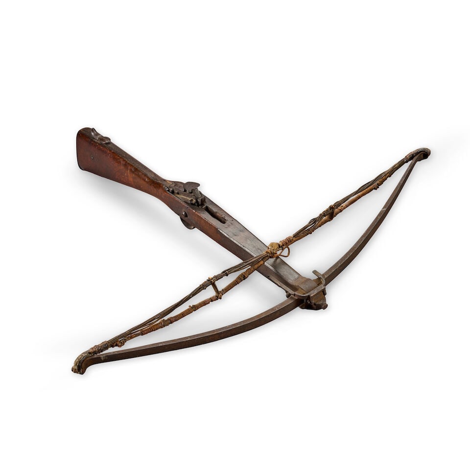 AN ENGLISH CROSSBOW SIGNED 'R. WILSON.': AN ENGLISH CROSSBOW SIGNED 'R. WILSON.' The steel bow mounted on a walnut stock with steel mechanism and trigger guard, the sighting piece stamped 'R.WILSON.' Lg. 28 1/2, wd. 28 in. For further