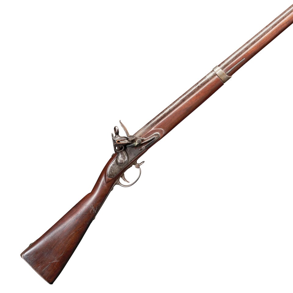 A RESTOCKED U.S. MODEL 1822/28 MUSKET.: A RESTOCKED U.S. MODEL 1822/28 MUSKET. Unmarked 42 in., .72 caliber barrel, lock marked 'SPRING/FIELD/1836' and with a spread wing eagle over 'US' below the brass pan; later walnut stock, iron furnitu