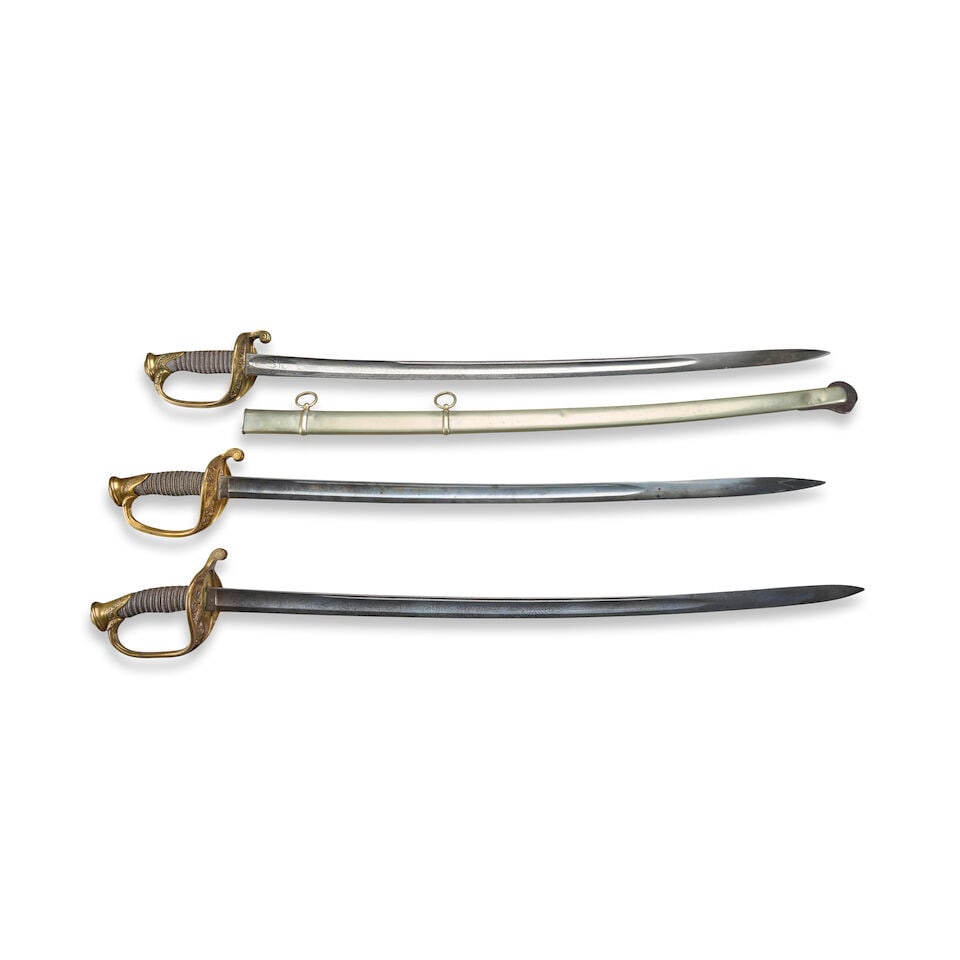 THREE CIVIL WAR U.S. MODEL 1850 FOOT OFFICER'S SWORDS. (1 of 2)