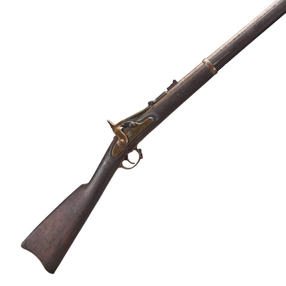 A U.S. MODEL 1866 (SECOND MODEL) ALLIN CONVERSION RIFLE,: A U.S. MODEL 1866 (SECOND MODEL) ALLIN CONVERSION RIFLE, Springfield Armory, 1866. 40 in., .50 Centerfire caliber, leaf rear sight, loading door marked '1866' and with eagle's head proof mark; lock ma
