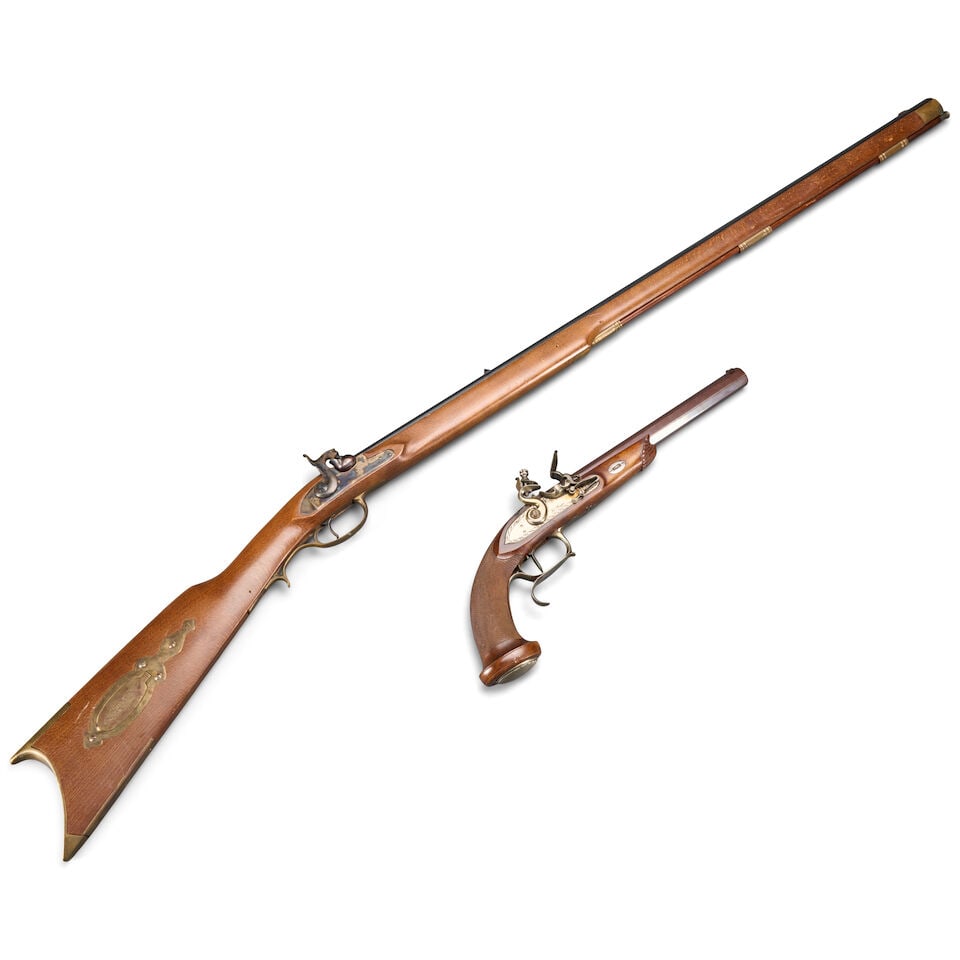 A REPRODUCTION FLINTLOCK PISTOL AND A REPRODUCTION PERCUSSION RIFLE. (1 of 2)