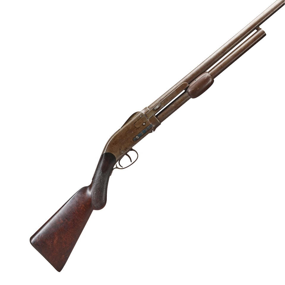 A SPENCER ARMS MODEL 1882 PUMP-ACTION SHOTGUN,: A SPENCER ARMS MODEL 1882 PUMP-ACTION SHOTGUN, c. 1882-1890. 30 in., 12 Gauge Damascus barrel marked on the top 'SPENCER ARMS CO. WINDSOR, CT. U.S.A PAT. APR. 1882.' steel frame, figured walnut stock 