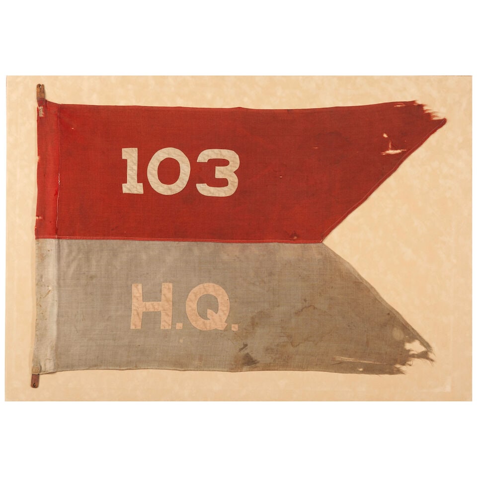 A WORLD WAR I 103RD HEADQUARTERS WOOL GUIDON.: A WORLD WAR I 103RD HEADQUARTERS WOOL GUIDON. Constructed of red and light blue wool bunting with applied cotton '103' and 'H.Q.', leather mounting tabs at the left corners, mounted to a backing board
