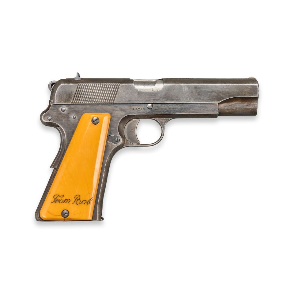A WORLD WAR II-ERA PRE-OCCUPATION 'POLISH EAGLE' RADOM VIS-35 PISTOL, Curio or Relic firearm: A WORLD WAR II-ERA PRE-OCCUPATION 'POLISH EAGLE' RADOM VIS-35 PISTOL, 1939. Serial number 48729, 9mm Luger caliber, blued slide and frame; the left side of the slide marked 'F.B. RADOM/1939r.' and 'VI