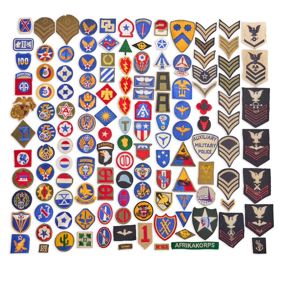 A COLLECTION OF APPROX. 130 WORLD WAR I, WORLD WAR II AND LATER PATCHES AND INSIGNIA.