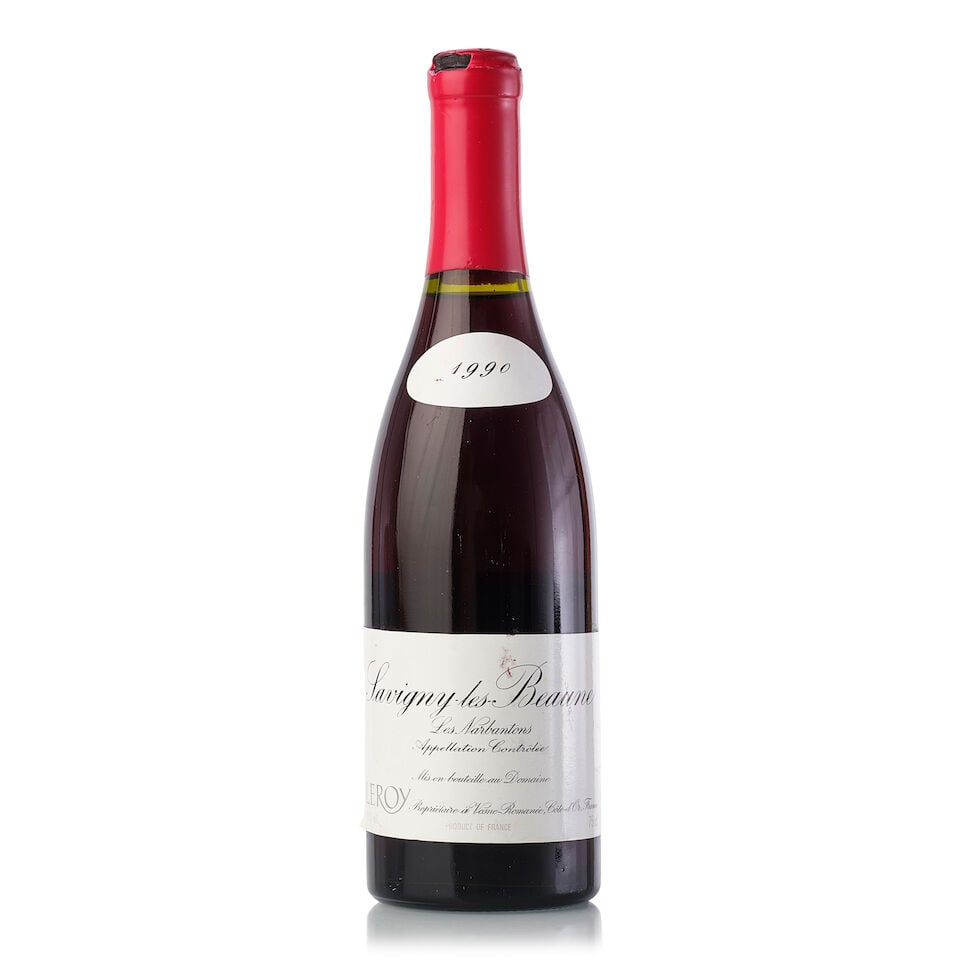 Domaine Leroy Savigny-lès-Beaune Les Narbantons, 1990 (1x 750ml): Domaine Leroy Savigny-lès-Beaune Les Narbantons, 1990 (1x 750ml) Region: Burgundy Fill Level: 1cm Capsule: damaged wax Cork: signs of old seepage Label: slightly stained front label and vintage t