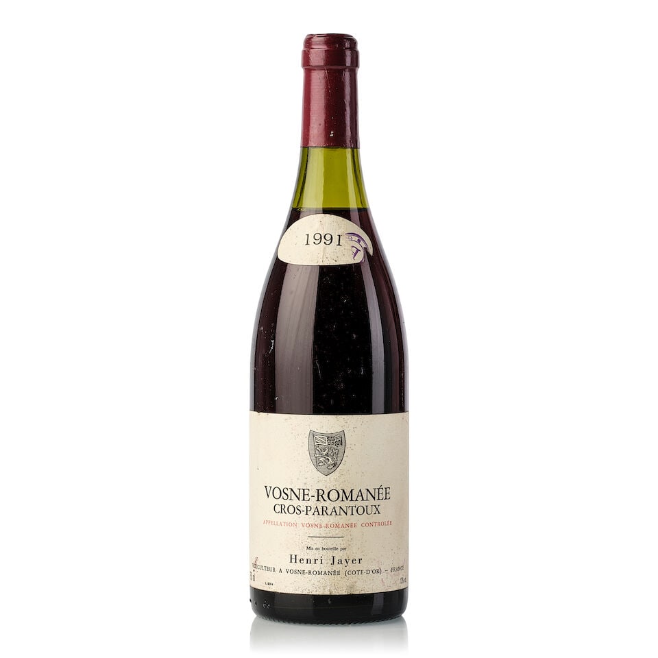 Henri Jayer Vosne Romanée Cros Parantoux, 1991 (1x 750ml): Henri Jayer Vosne Romanée Cros Parantoux, 1991 (1x 750ml) Region: Burgundy Fill Level: 2.5cm Capsule: slightly torn, scuffed Cork: signs of old seepage Label: bin-soiled, stamp on vintage tag, sl