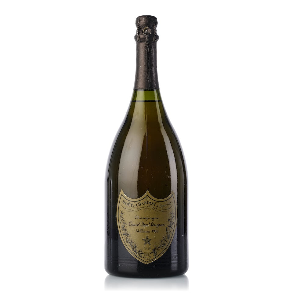 Dom Pérignon, 1988 (1x Magnum): Dom Pérignon, 1988 (1x Magnum) Region: Champagne Fill Level: 1.5cm inverted Capsule: slightly oxidised, slightly torn Label: scuffed, bin-soiled For further information on this lot please visit B