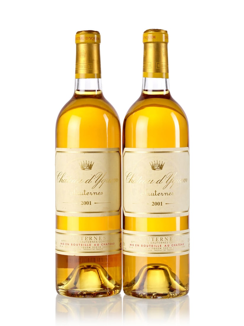 Château d'Yquem, 2001 (7x 750ml): Château d'Yquem, 2001 (7x 750ml) Region: Bordeaux Capsule: 1x slightly corroded Cork: 3x slightly protruded Label: 6x slightly bin-soiled, 2x stained, 1x heavily stained, 1x partially faded For f