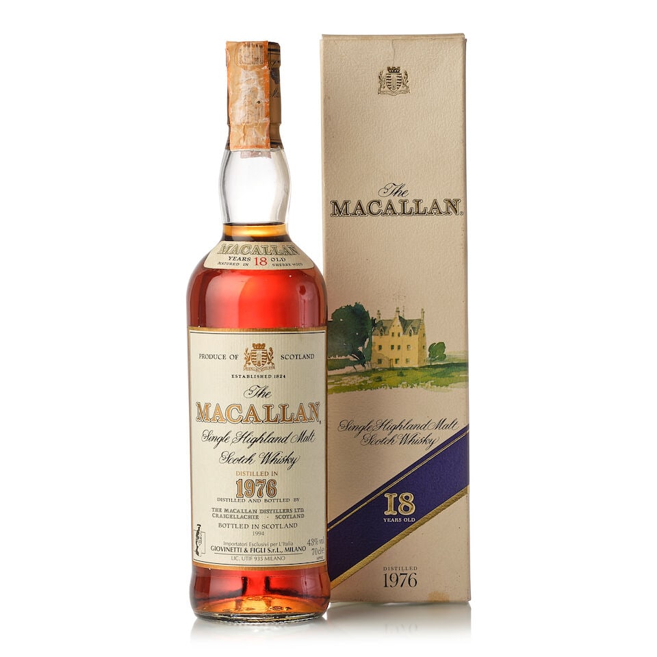 The Macallan 18 Year Old, 1976 (1x 700ml): The Macallan 18 Year Old, 1976 (1x 700ml) Region: Speyside Fill Level: into neck Capsule: slightly scuffed, nicked and partially wax attached capsule seal Label: bin-soiled and stained labelling Packa