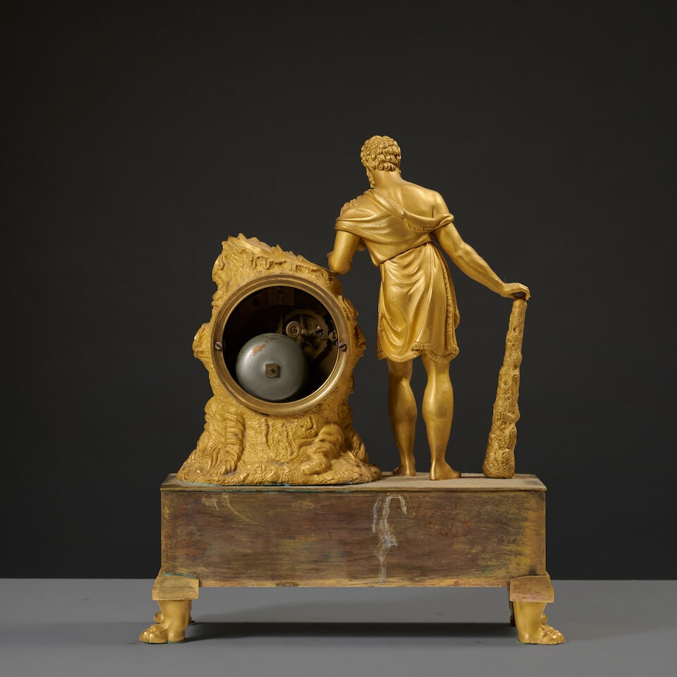 Pendule en bronze doré et ciselé figurant Heraclès d'époque Restauration A g... - 2