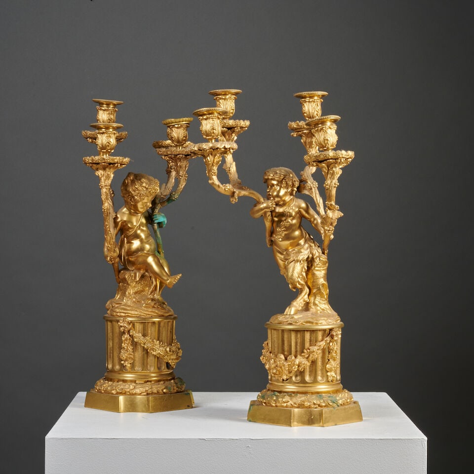 Paire de candélabres à quatre lumières du milieu du XIXe siècle A pair of fo...: Paire de candélabres à quatre lumières du milieu du XIXe siècle A pair of four-light candelabra mid-19th century Les quatre bras de lumière feuillagés de forme rocaille