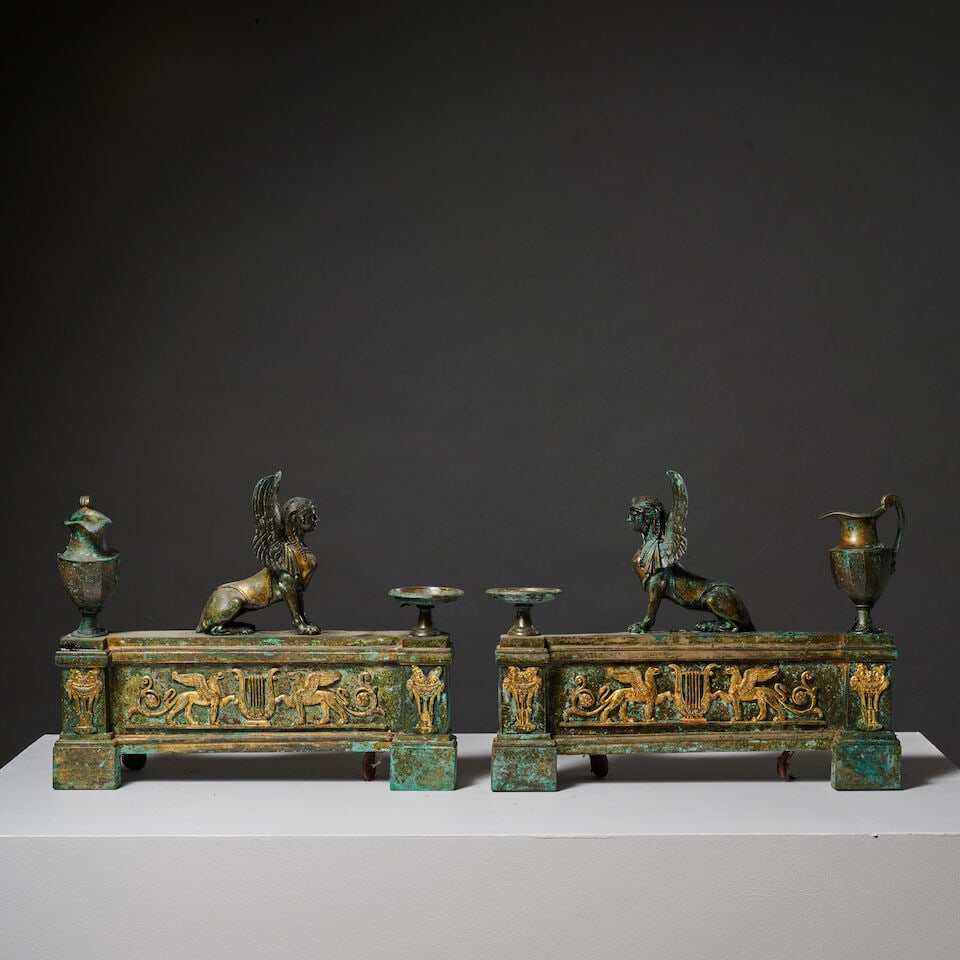 Paire de chenets en bronze patiné et doré d'époque Empire A pair of Empire period... (1 of 2)