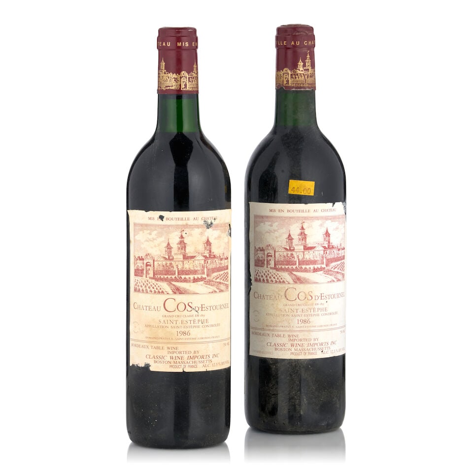 Château Cos d'Estournel, 1986 (2 bottles, 750ml): Château Cos d'Estournel, 1986 (2 bottles, 750ml) Region: Saint-Estèphe Fill Level: top shoulder Label: lightly bin soiled, faded, and nicked Footnotes: Left Bank, Bordeaux This lot is