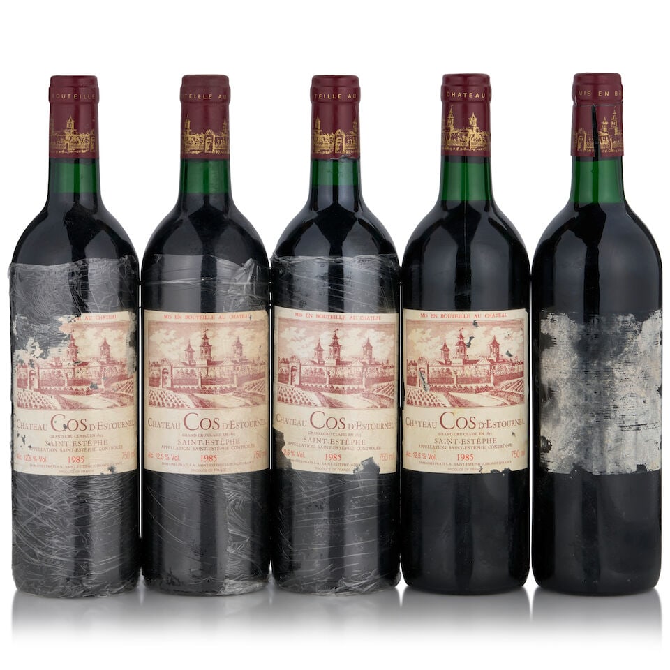 Château Cos d'Estournel, 1985 (5 bottles, 750ml): Château Cos d'Estournel, 1985 (5 bottles, 750ml) Region: Saint-Estèphe Fill Level: bottom neck or better Capsule: lightly worn, three nicked, one capsule cut by Bonham's specialist Label: li
