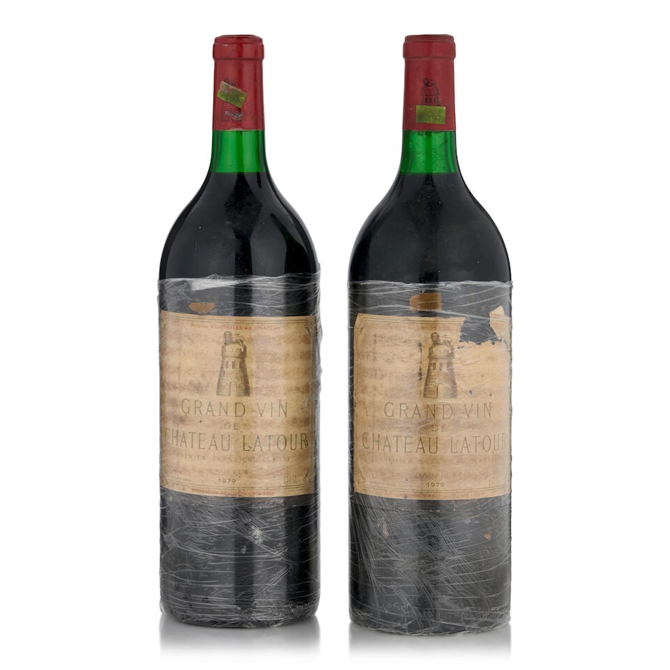 Château Latour, 1979 (2 bottles, 1.5L): Château Latour, 1979 (2 bottles, 1.5L) Region: Pauillac Fill Level: bottom neck Capsule: lightly worn Label: both bin soiled, faded, glue striped, completely unaffixed, one torn Footnotes: Left