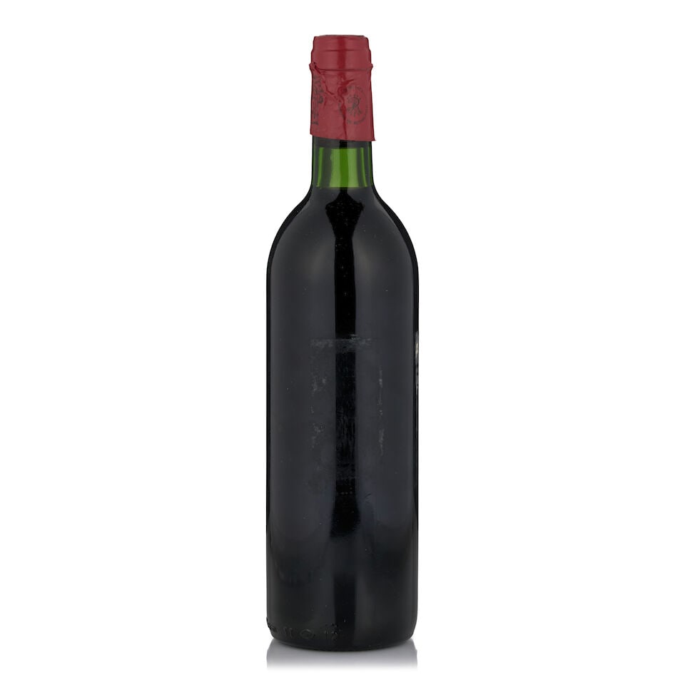 Château Lafite Rothschild, 1981 (1 bottle, 750ml): Château Lafite Rothschild, 1981 (1 bottle, 750ml) Region: Pauillac Fill Level: very top shoulder Capsule: cut by Bonhams' specialist to reveal branded cork Label: missing Footnotes: Bordeaux, Lef