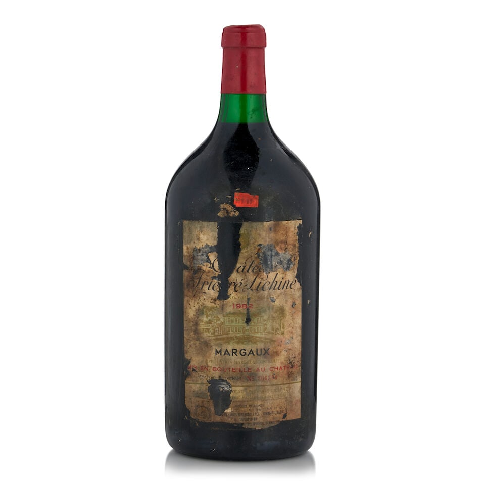 Château Prieuré-Lichine, 1982 (1 bottle, 3L): Château Prieuré-Lichine, 1982 (1 bottle, 3L) Region: Margaux Fill Level: top shoulder Capsule: lightly wrinkled Label: heavily bin soiled, stained, and torn with losses Footnotes: Left Bank,