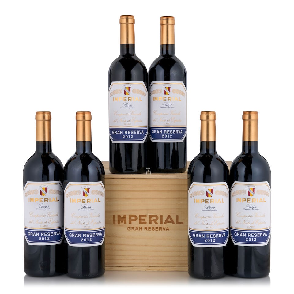 CVNE, Rioja Imperial Gran Riserva, 2012 (6 bottles, 750ml): CVNE, Rioja Imperial Gran Riserva, 2012 (6 bottles, 750ml) Region: Spain Packaging: original wooden case This lot is subject to the following lot symbols: • • Zero rated for tax, no tax