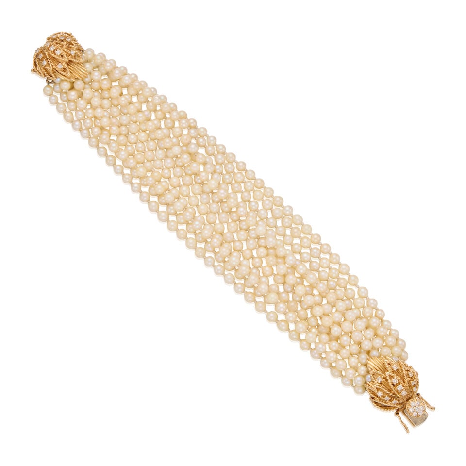 14K GOLD, CULTURED PEARL AND DIAMOND BRACELET: 14K GOLD, CULTURED PEARL AND DIAMOND BRACELET • Twelve rows with cultured pearls measuring approximately 4.07mm to 4.28mm in diameter • Twenty-nine round single cut diamonds weighing