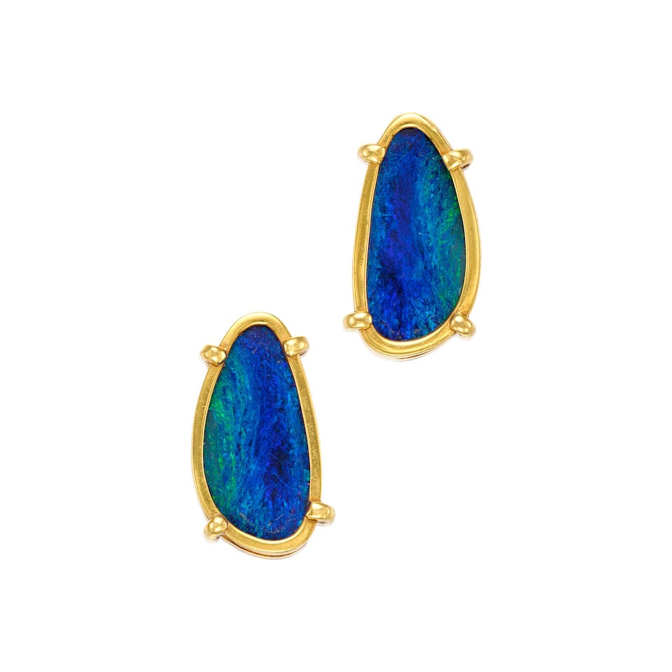 18K YELLOW GOLD AND BOULDER OPAL EARRINGS: 18K YELLOW GOLD AND BOULDER OPAL EARRINGS • Two oval shaped boulder opals measuring approximately 22.00mm x 9.97mm x 2.27mm • Measures 1 in. x 1/2 in. • Estimated gross weight: 12.7
