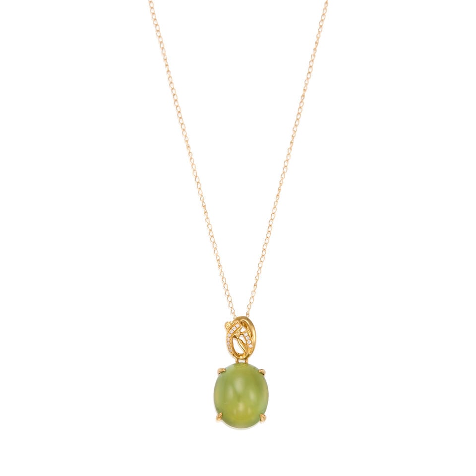 A GOLD, PREHNITE AND DIAMOND NECKLACE: A GOLD, PREHNITE AND DIAMOND NECKLACE • A 18K gold pendant with one oval cabochon shaped prehnite weighing approximately 8.25 carats total and twelve round brilliant cut diamonds weighing