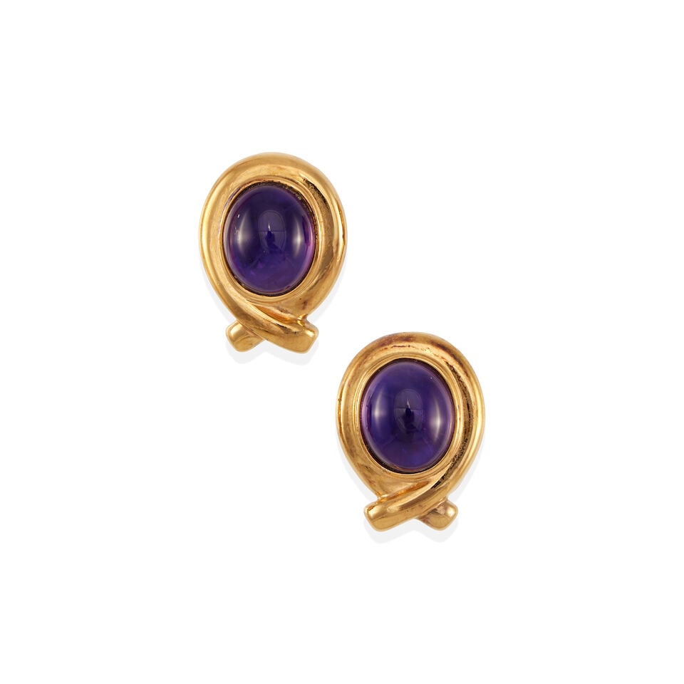 A PAIR OF GOLD-PLATED SILVER AND AMETHYST EARRINGS: A PAIR OF GOLD-PLATED SILVER AND AMETHYST EARRINGS • 8K gold topped silver • Two oval amethyst cabochons measuring approximately 12.93mm x 10.90mm • Measures 7/8 in. x 5/8