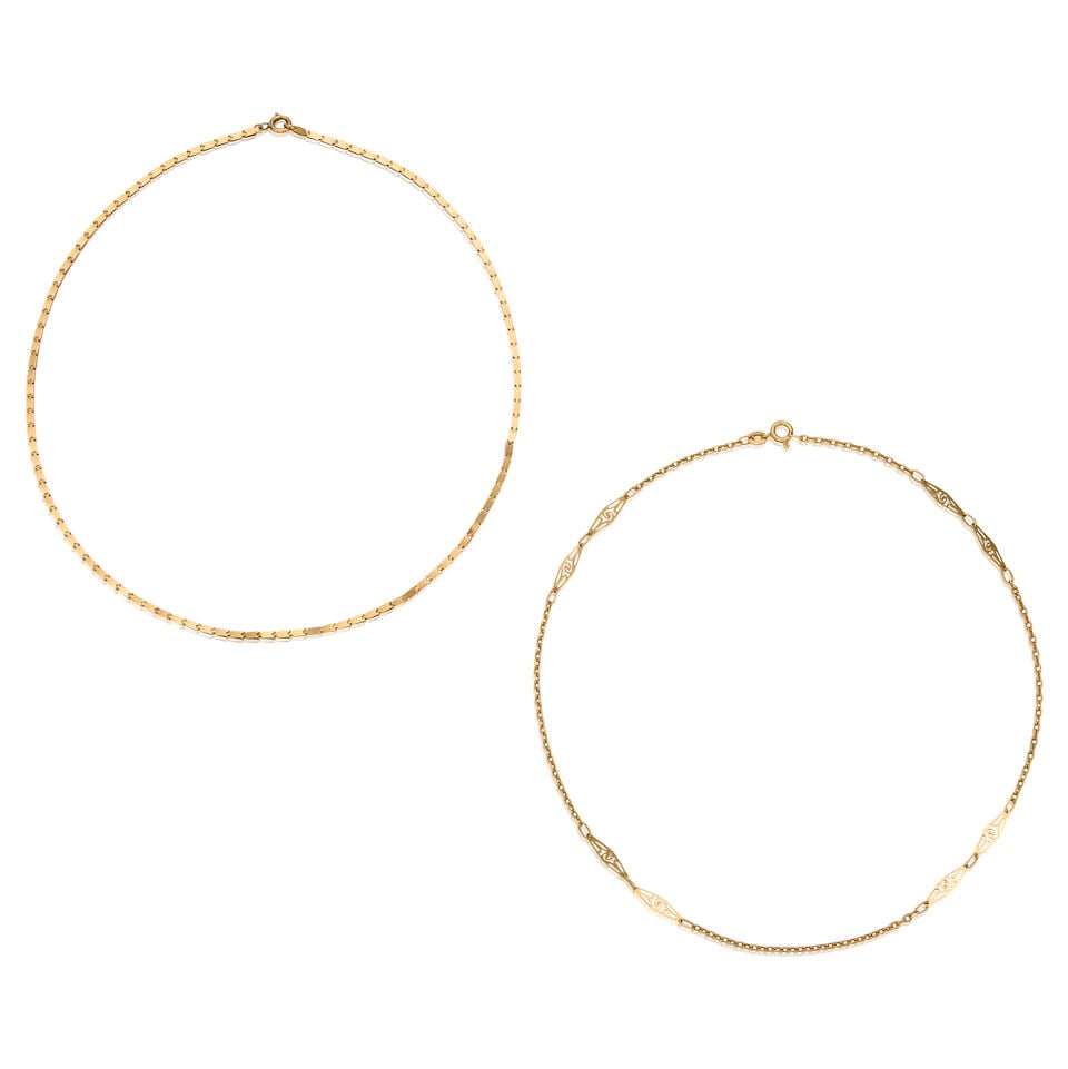 18K YELLOW GOLD CHAINS: 18K YELLOW GOLD CHAINS • Two 18K yellow gold chains • Length 16 1/2 in. and 15 1/2 in. • Estimated gross weight: 10.50 grams Footnotes: OVERALL CONDITION: Very good Metal purity