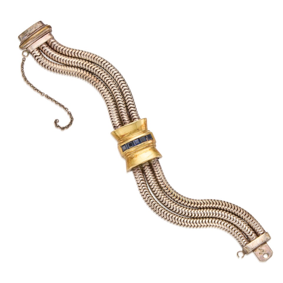 TIFFANY & CO.: SAPPHIRE BRACELET: TIFFANY & CO.: SAPPHIRE BRACELET • 17K gold and three row of sterling silver straps with safety chain • Five square shaped sapphires weighing approximately 0.60 carats total • Stampe
