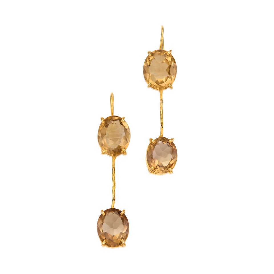 18K YELLOW GOLD AND SMOKY QUARTZ EARRINGS: 18K YELLOW GOLD AND SMOKY QUARTZ EARRINGS • Four oval shaped smoky quartz weighing approximately 17 carats total • Measures 2 1/8 in. x 1/2 in. • Estimated gross weight: 9.8
