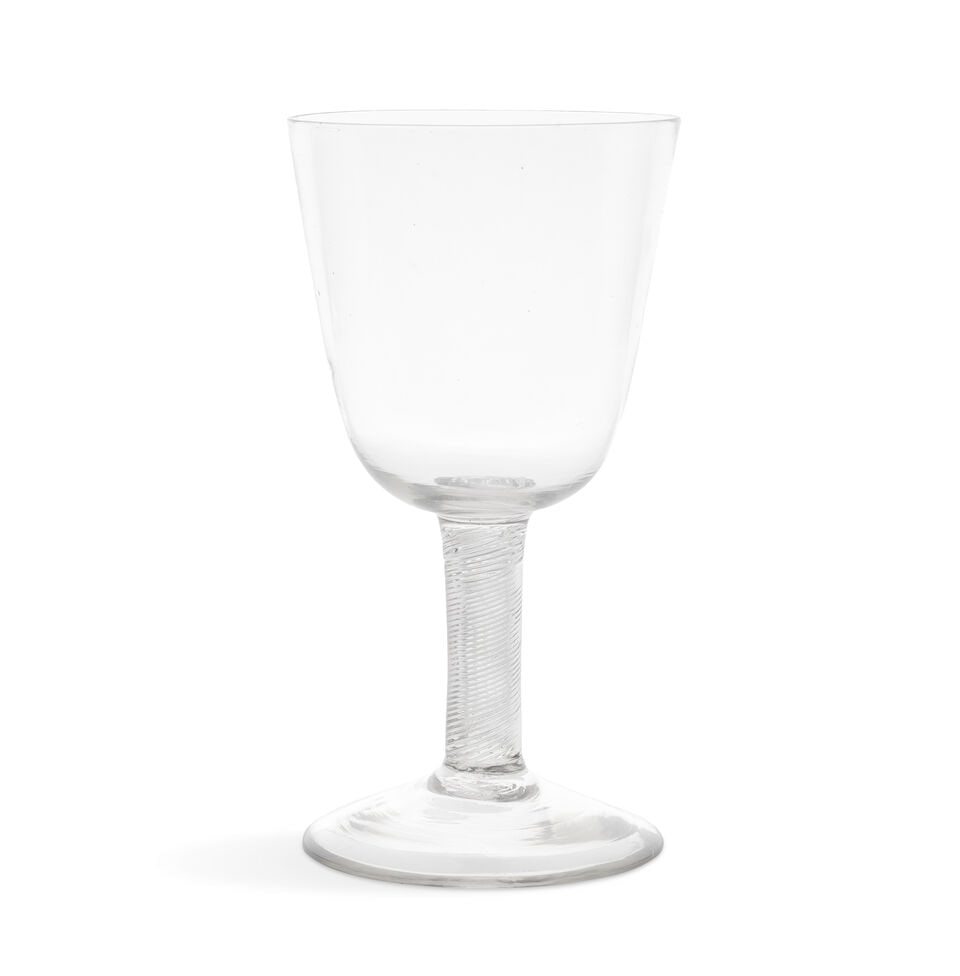 A mammoth airtwist goblet, circa 1750: A mammoth airtwist goblet, circa 1750 Of ceremonial proportions, the generous round funnel bowl set on a multi-spiral airtwist stem and conical foot, 26.8cm high Footnotes: Provenance With Mark J