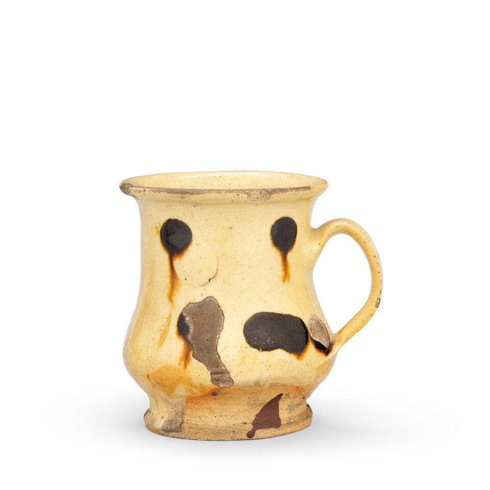 A Staffordshire slipware mug, late 17th or early 18th century - 2