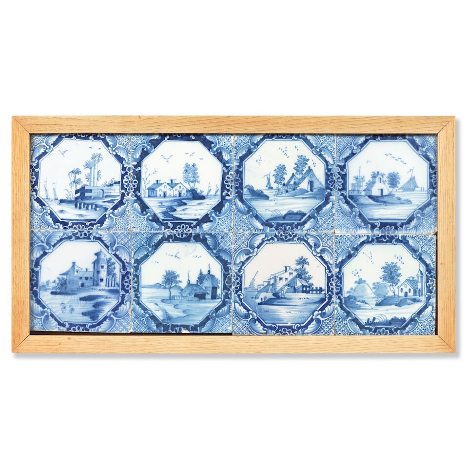 A set of eight Liverpool delftware tiles, circa 1750-70: A set of eight Liverpool delftware tiles, circa 1750-70 Painted in blue with a variety of lakeside landscape scenes, one with classical ruins before the waterside with boats in the distance, the