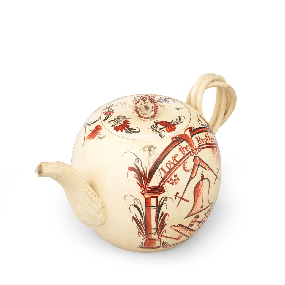 A Masonic creamware teapot and cover, circa 1770 - 2