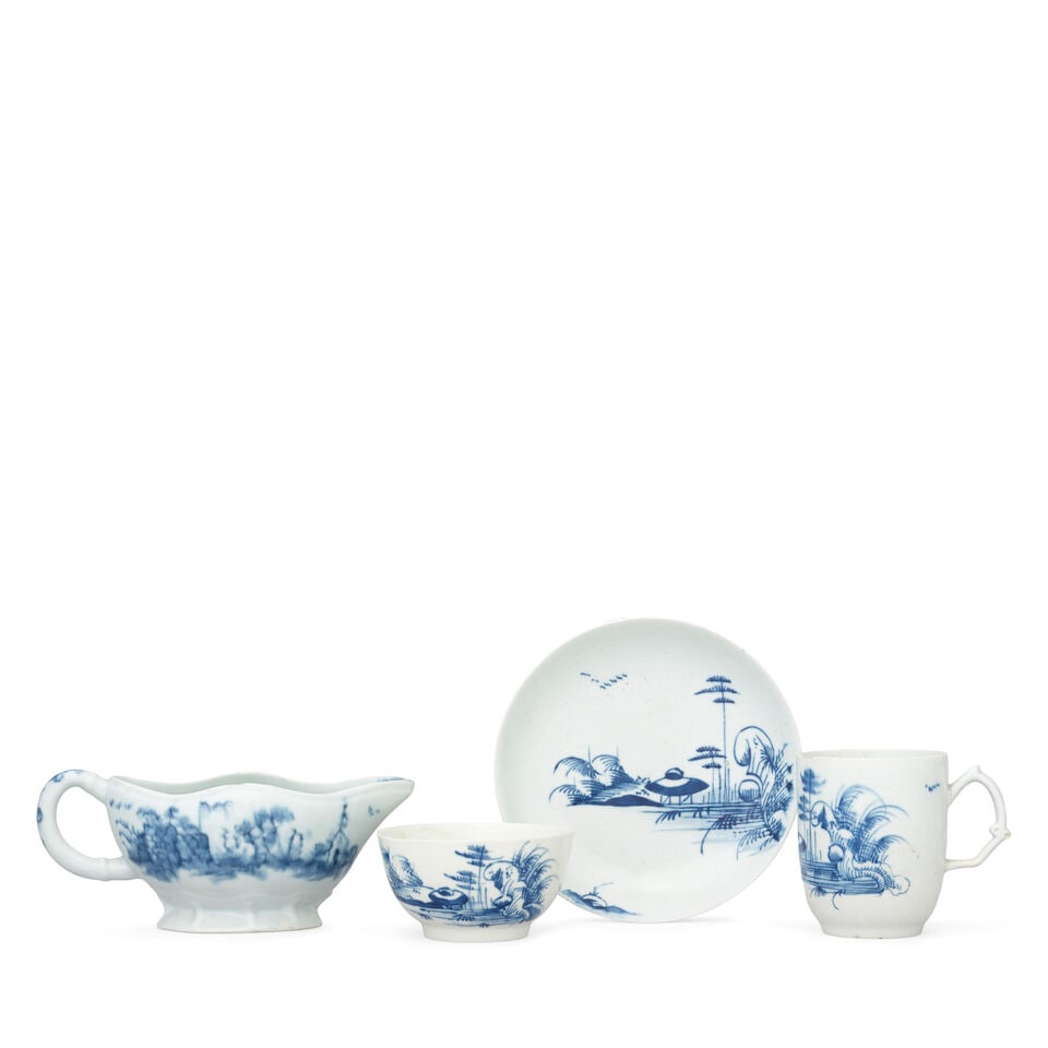 A Longton Hall sauceboat, a coffee cup and a teabowl and saucer, circa 1753-60: A Longton Hall sauceboat, a coffee cup and a teabowl and saucer, circa 1753-60 The first raised on a low fluted foot, the handle moulded with rings simulating a silver shape, painted in blue on both s