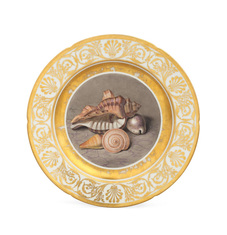 An important Coalport plate painted by Thomas Baxter, dated 1809: An important Coalport plate painted by Thomas Baxter, dated 1809 Finely painted to the centre with an arrangement of four shells on a marbled tabletop, signed 'Baxter 1809', within a wide solid gilt b