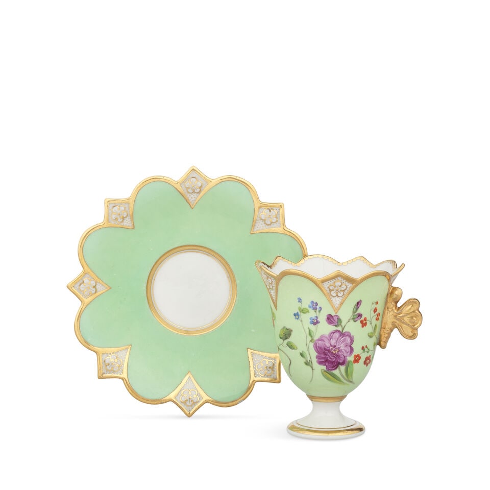 A Flight, Barr and Barr Worcester cabinet cup and stand, circa 1830: A Flight, Barr and Barr Worcester cabinet cup and stand, circa 1830 The small tulip cup applied with a gilt butterfly handle, the gilt shaped rims moulded with florets left in the white, the cup